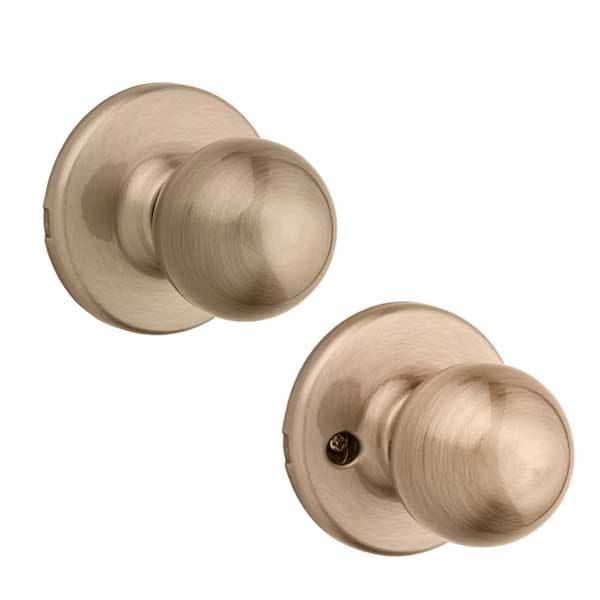 Kwikset: Polo Passage Door Knob with Round Rose / Antique Brass